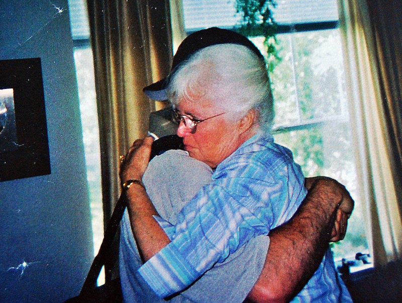 Mickey and his mom share a hug. Photo credit: Mickey Z.