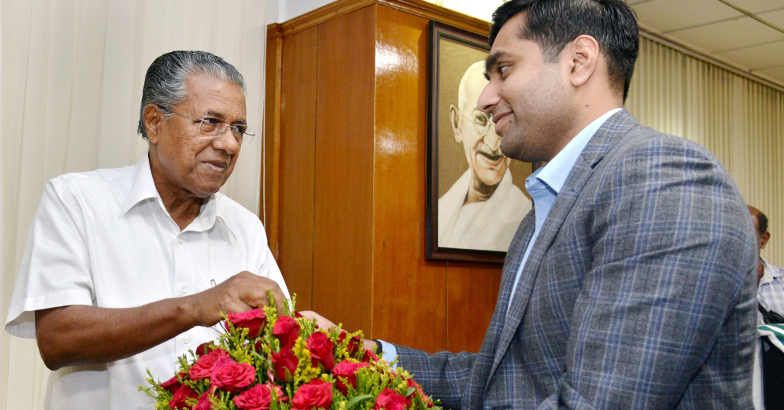 Kerala chief minister Pinarayi Vijayan greets Adani Ports CEO Karan Adani in Thiruvananthapuram