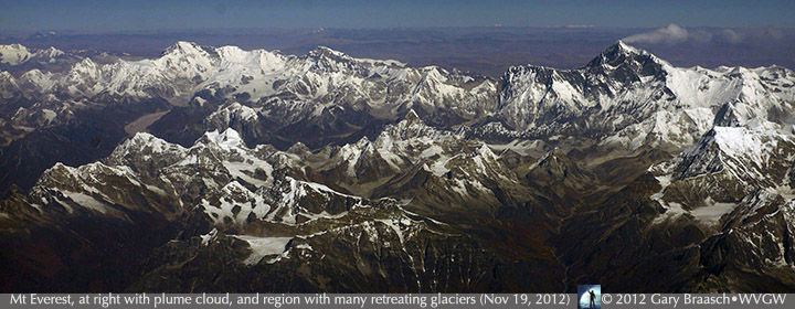 Mount Everest -- also called Sagarmāthā in Nepali; Chomolungma in Tibetan -- the Earth's highest mountain, with a peak at 8,848 meters (29,029 ft) above sea level. Also visible in this airliner view from about 30,000 feet are other 8000 meter peaks such as Makalu, Cho Oyu and Lohtse. Note the large number of glaciers with clear signs of melting, such as debris covered and fractured ablation zones and newly revealed bare rock below the ends of the glaciers.