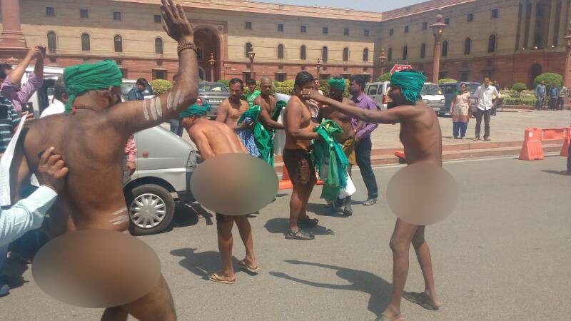 Tamil Nadu farmers strip outside Prime Minister Narendra Modi's Office in protest demanding waiver of loans