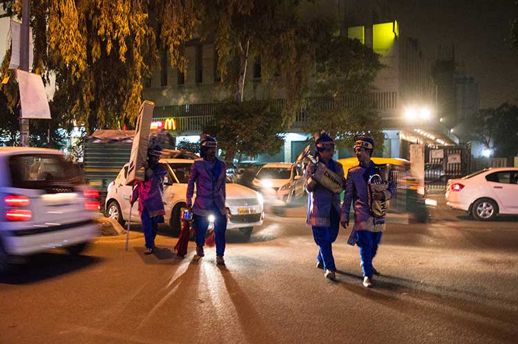Band wallahs walk towards a wedding venue. Photo courtesy: Sadia Akhtar