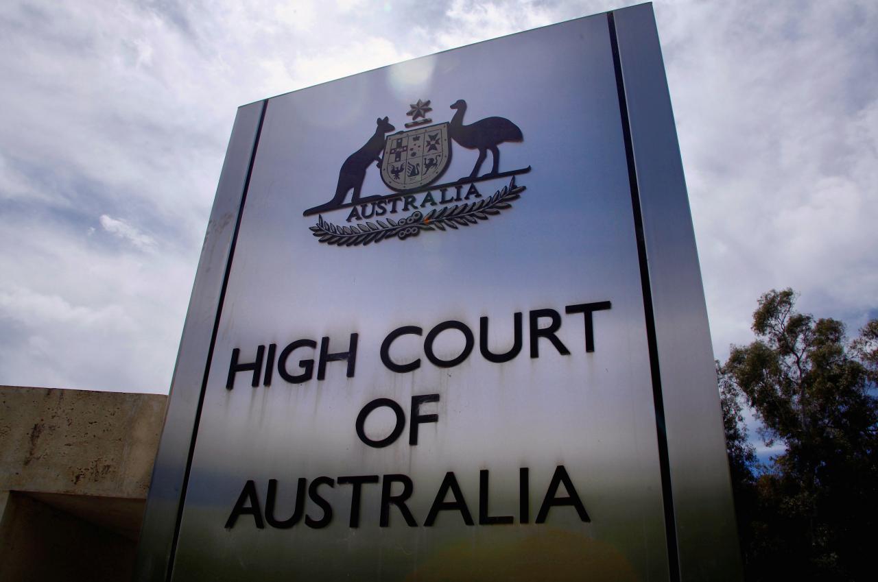 FILE PHOTO: A sign stands outside the High Court of Australia in Canberra, Australia, October 15, 2014.  REUTERS/David Gray/File photo