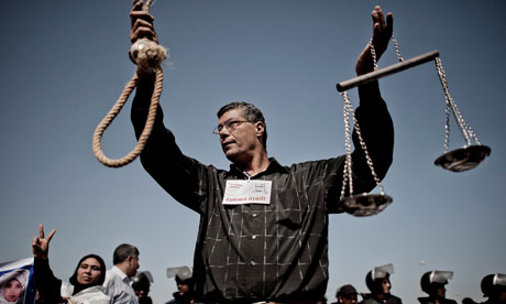 an anti-Mubarak protester demands the death penalty for ousted Egyptian president's trial in Cairo