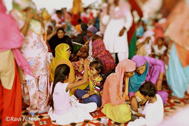 Children playing in temporary refuge camp.jpg