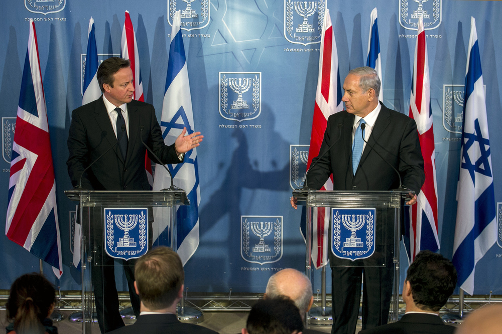 Israeli Prime Minister Benjamin Netanyahu (R) and his British counterpart David Cameron attend a joint press conference in Jerusalem on March 12 2014, following their meeting. British Prime Minister David Cameron is on two days visit to Israel and Palestinian territories. Photo by Olivier Fitoussi/POOL/Flash90