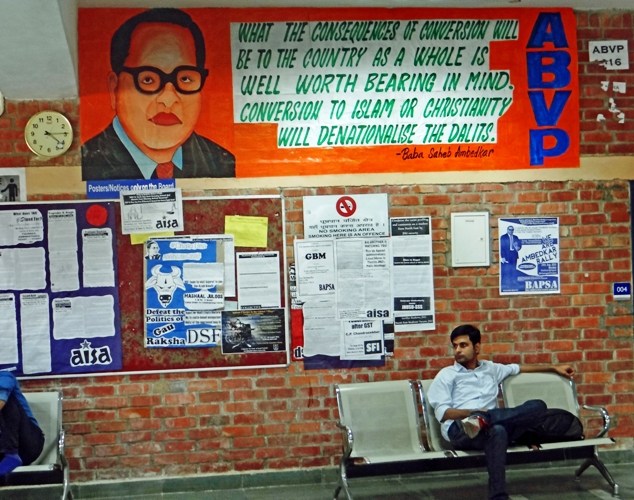 This is the latest ABVP’s poster put up on the wall of SIS building (new) of JNU with the portrait of Dr. Ambedkar. The poster qoutes him without mentioning the reference as saying that if Dalits convert to Islam or Christianity, it will “denationalize them”. Photo: Samim Asgor Ali