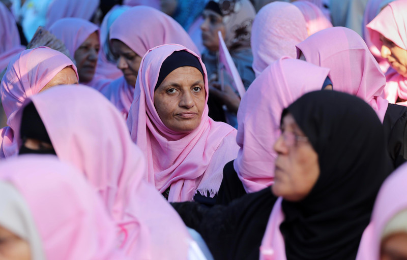 Cancer patients take part in a rally to raise awareness about Breast Cancer in Gaza City on 26 October. Mohammed Asad APA images