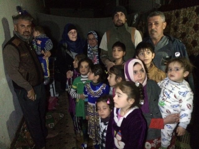 With families living on roadside near Najaf, Iraq