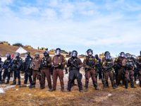 Riot police at the Oceti Sakowin Camp. Photo by Rob Wilson.