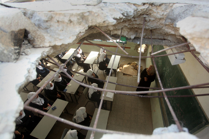 A classroom at the Martyrs School in Khuzaa, which was damaged by Israeli shelling in the summer of 2014, as well as in previous assaults on Gaza, photographed in August 2015. Ashraf Amra APA images