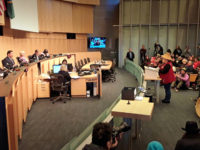 Standing Rock Sioux tribal member Olivia One Feather testifies before the Seattle City Council in favor of divestment from Wells Fargo. Photo by J. Gabriel Ware.