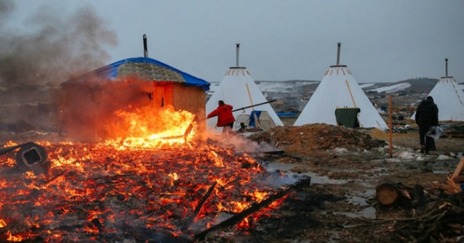 "The ongoing struggle will not go down in the flames at Oceti Sakowin," writes Ladha. (Photo: Stephen Yang/Getty Images)