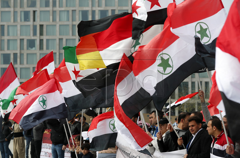 epa05919710 Demonstrators hold flags of the region of Al-Ahwaz as they take part in a rally in support of the Ahwazi minority in Iran, in Berlin, Germany, 21 April 2017. Dozens of demonstrators took part in the march striving for the recognition of this minority and their human rights. The Ahwazi live within the Iranian province of Khuzestan and constitute an ethnic, linguistic and cultural minority in Iran.  EPA/FELIPE TRUEBA