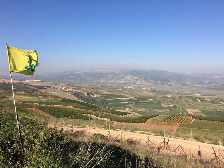 Hezbollah flag over Israeli border 