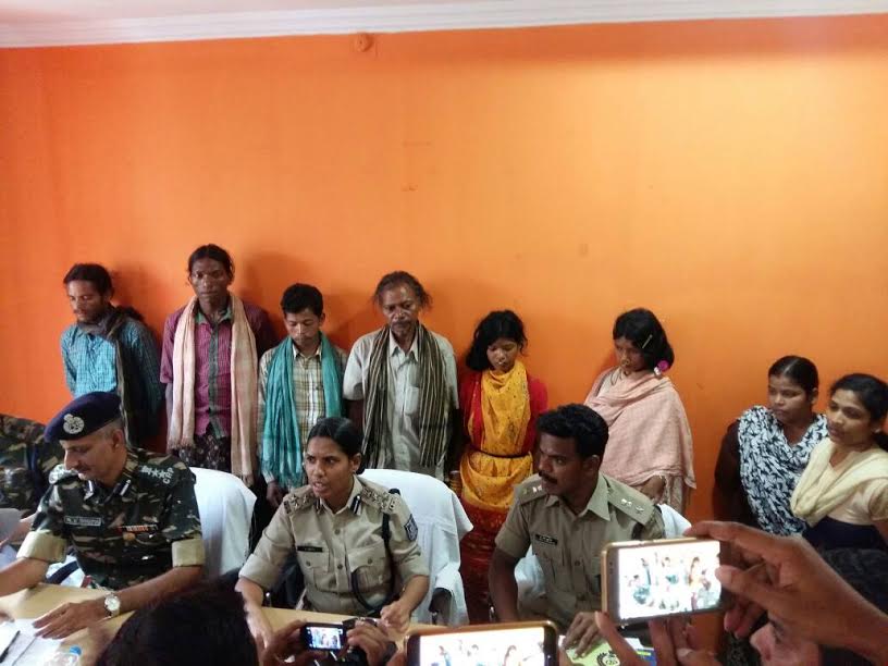Kuni Sikaka (in yellow) with her relatives at the office of the superintendent of police at Rayagada, Odisha, on May 3.