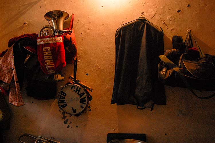 Musical instruments along with personal belongings of members are haung on the wall of their room in New Delhi: Photo Courtesy: Sadia Akhtar