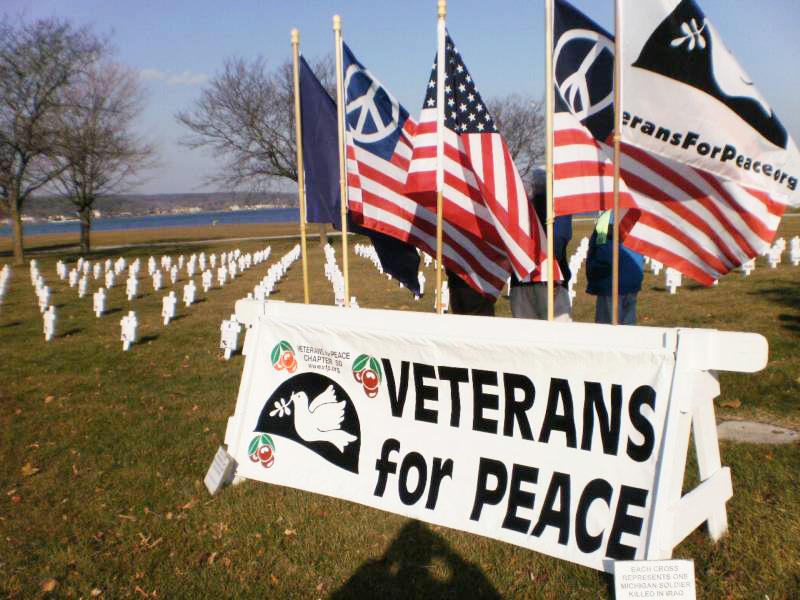 Veterans for Peace, Northwest Michigan Chapter 50 publicly honors fallen Michigan service men and women with flags and crosses on Memorial Day and Veterans Day. Photo Special to the Insider
