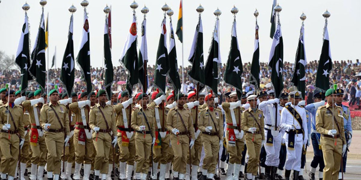 ISLAMABAD: Personnel of Armed Forces march-past during full dress rehearsal of Pakistan Day parade. INP PHOTO