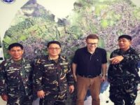 Andre Vltchek with military leaders in Marawi, Philippines.