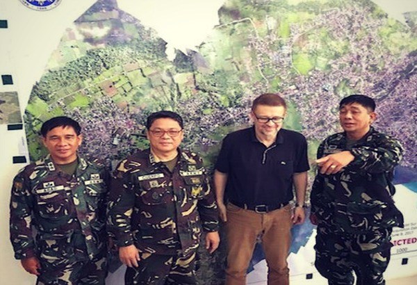 Andre Vltchek with military leaders in Marawi, Philippines. 