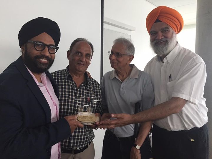 Amandeep Singh being honoured by Parshottam Dosanjh, Chinmoy Banerjee and Gian Singh Gill.