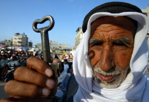 RAFAH REFUGEE CAMP, GAZA STRIP - MAY 15:  Palestinian refugee Mohamad Mahmoud Al-Arja, 80, from the Rafah refugee camp, holds up a key allegedly from his house in Beer AI-saba, now located in Israeli, during a rally May 15, 2007 the in Rafah refugee camp, southern Gaza strip. Palestinians are marking May 15, as Nakba Day or Catastrophe Day, as the 59th anniversary of the al-Nakba, the day the Israeli state was created in 1948.  (Photo by Getty Images)
