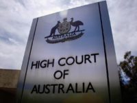 FILE PHOTO: A sign stands outside the High Court of Australia in Canberra, Australia, October 15, 2014.  REUTERS/David Gray/File photo