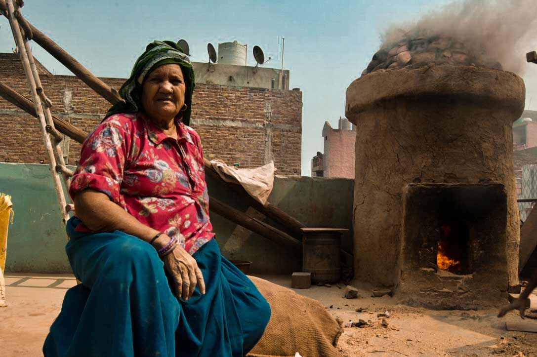 The whole village has abundance of burning furnaces adding to the respiratory problems. Kamla Devi and her son are of many who have to constantly deal with the choking smoke.