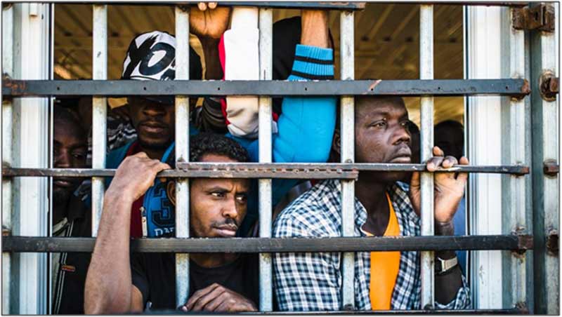 Thousands of loyalists and migrants from other African countries languish in prisons.