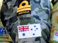 Tri-Service uniform deployed to Operation Queensland Flood Assist.

Tri - service badges