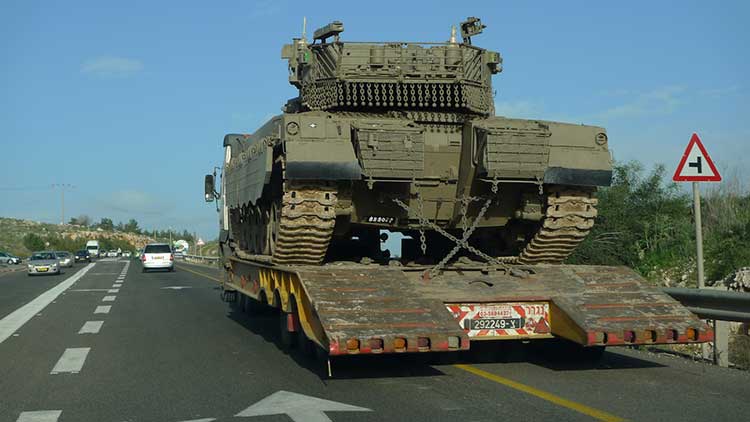 Israeli tank being moved towards Golan Heights