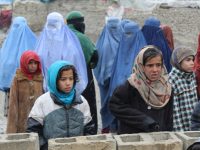 Girls and mothers, waiting for their duvets, in Kabul Photo credit: Dr. Hakim