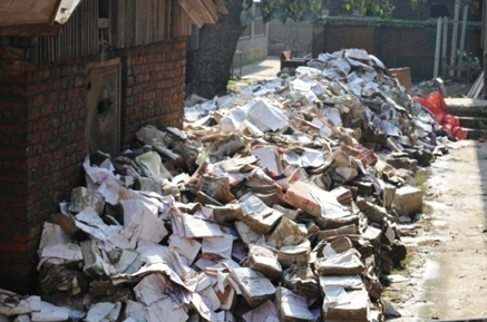 Heaps of flood damaged books