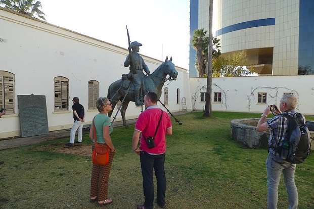 German tourists admiring statue of Keiser in Windhoek