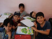 Children in Damascus taking summer programme