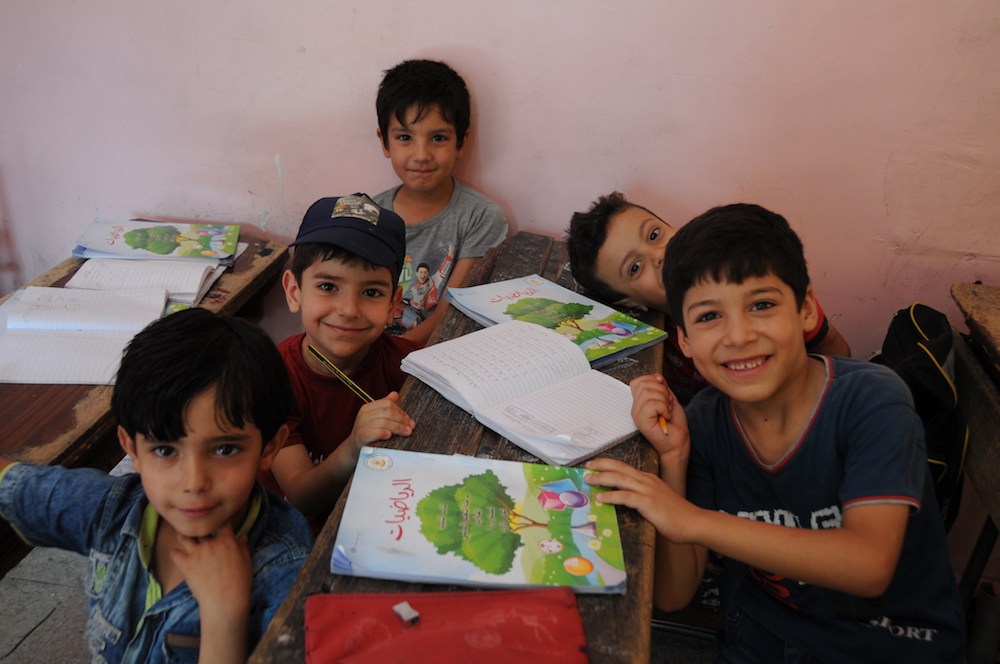 Children in Damascus taking summer programme