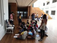 children studying art at Singapore National Art Gallery