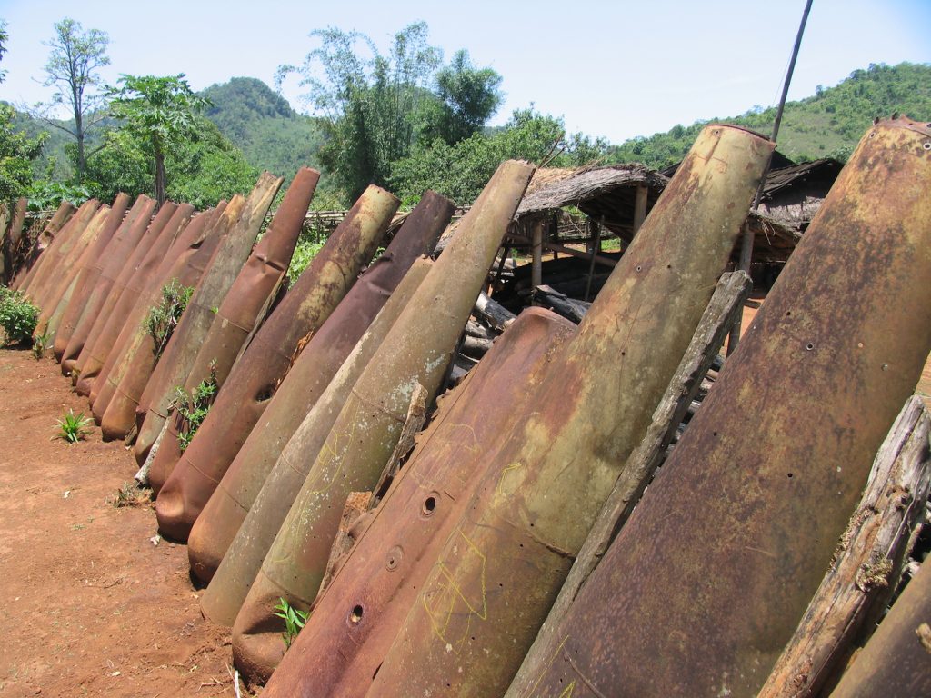 Laos Plain of Jars village fence made of American bombs copy 2