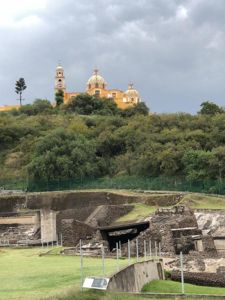 Catholic church arrogantly slammed on top of the biggest pyramid in the world outside Puebla
