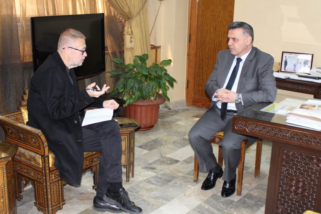 working with Syrian Minister of Education