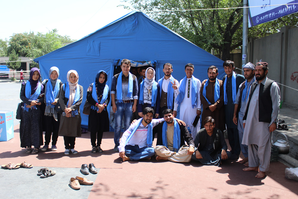 07 29 18 PPM members meet Afghan Peace Volunteers outside UK Embassy in Kabul photo credit Dr Hakim