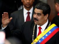 Venezuela's sitting president, Nicolás Maduro, attends a ceremony Thursday in Caracas to mark the opening of the judicial year at the Supreme Court of Justice. Opposition leader Juan Guaidó has declared himself the interim president, but Maduro has not ceded pow
