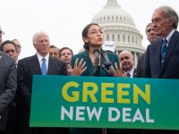 US Representative Alexandria Ocasio-Cortez, Democrat of New York, and US Senator Ed Markey (R), Democrat of Massachusetts, speak during a press conference to announce Green New Deal legislation to promote clean energy programs outside the US Capitol in Washington, DC, February 7, 2019. (Photo by SAUL LOEB / AFP)        (Photo credit should read SAUL LOEB/AFP/Getty Images)