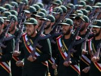 epa03878004 Iranian revolutionary guard soldiers march during the annual military parade marking the Iraqi invasion in 1980, which led to an eight-year-long war (1980-1988) in Tehran, Iran, 22 September 2013. Iranian president Hasan Rowhani said that Iran only wants to end the civil war in Syria for avoiding a new escalation of violence in the Middle East.  EPA/ABEDIN TAHERKENAREH