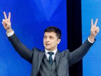 Presidential candidate Volodymyr Zelenskiy reacts during a policy debate with his rival, Ukraine's President Petro Poroshenko at the National Sports Complex Olimpiyskiy stadium on April 19, 2019, in Kyiv.