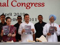 Rahul Gandhi (C), President of India's main opposition Congress party, his mother and leader of the party Sonia Gandhi and India's former Prime Minister Manmohan Singh (R) display copies of their party's election manifesto for the April/May general election in New Delhi, India, April 2, 2019. REUTERS/Adnan Abidi