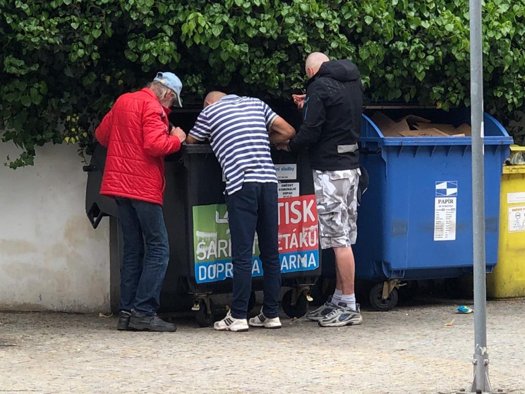 In Pilsen Czechia people raiding garbage in order to eat