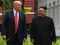 North Korea's leader Kim Jong Un (R) walks with US President Donald Trump (L) during a break in talks at their historic US-North Korea summit, at the Capella Hotel on Sentosa island in Singapore on June 12, 2018.

Donald Trump and Kim Jong Un became on June 12 the first sitting US and North Korean leaders to meet, shake hands and negotiate to end a decades-old nuclear stand-off. / AFP PHOTO / SAUL LOEBSAUL LOEB/AFP/Getty Images