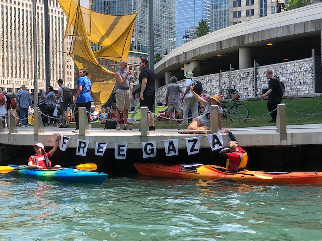 kayakers with Free Gaza sign