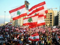 Mass revolt in Lebanon: General strike begins as marchers call for revolution